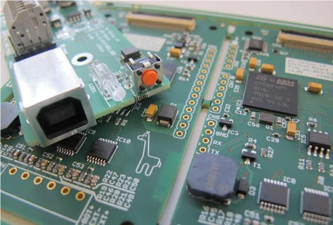 Populated circuit boards with connectors and components illustrating PCB Assembly