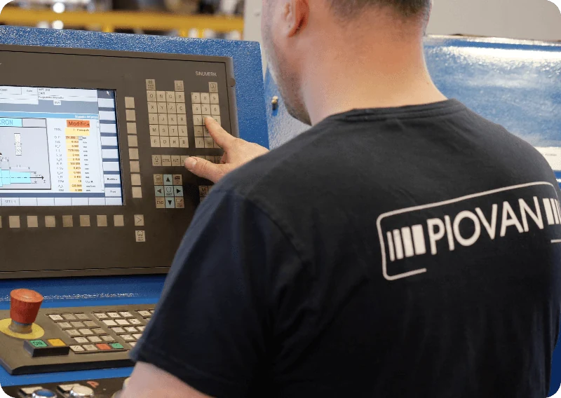 A.Piovan operator at a production machine control panel