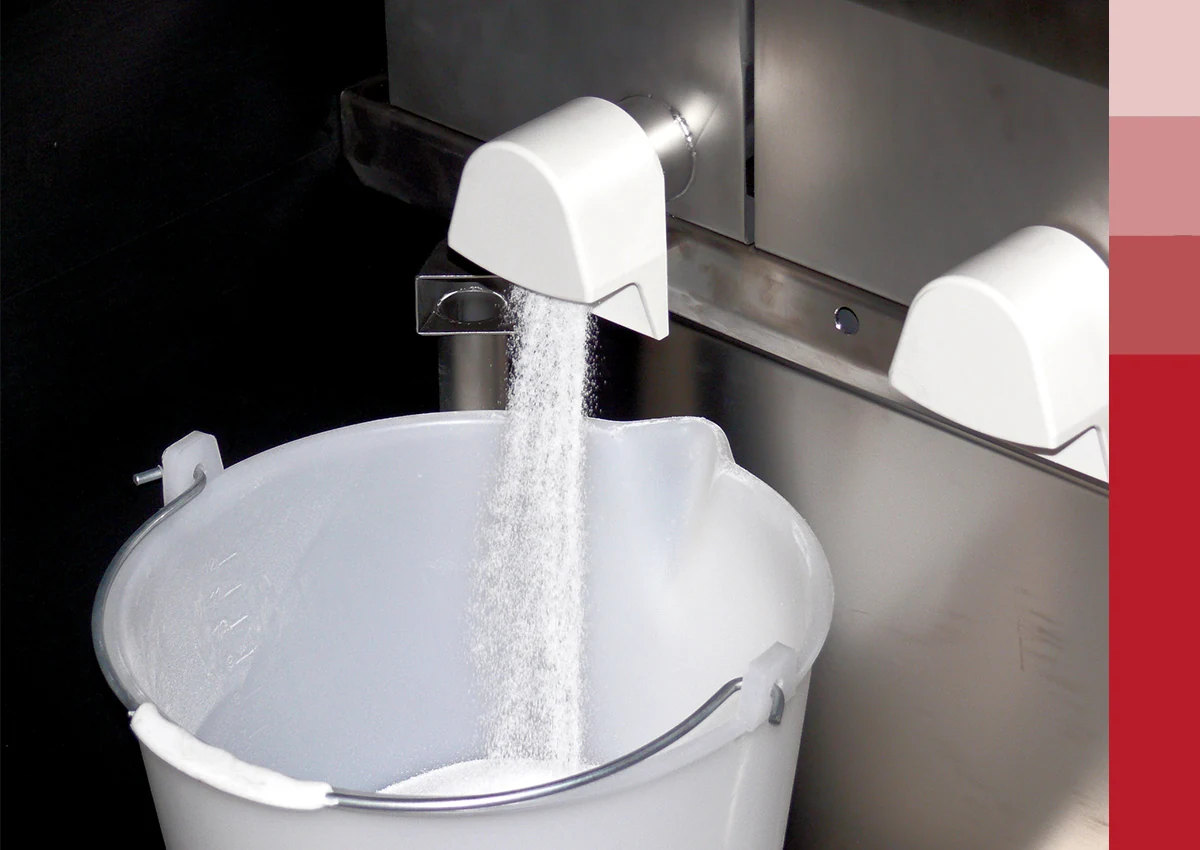 UNICA dosing powder into a recipe bucket