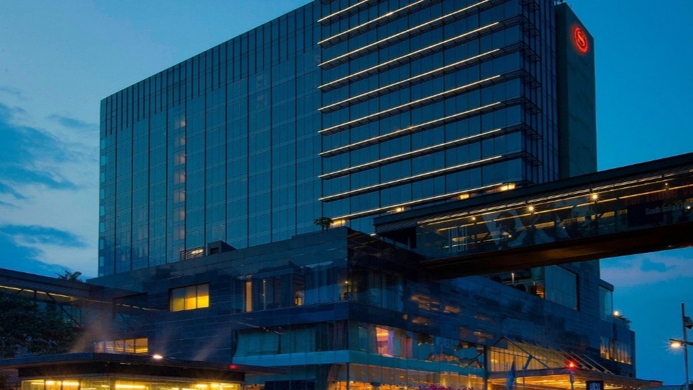 Host venue exterior — Black Hat India 2026